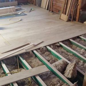 12 Oak floor being fitted over new joists and insulation